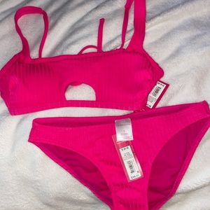 New with tags. Size small pink bikini.